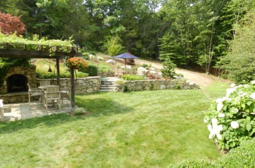 Bolton Landscape Design & Masonry specializing in plantings, sprinkler systems, patios, grills, driveway construction, and grading since 1979.