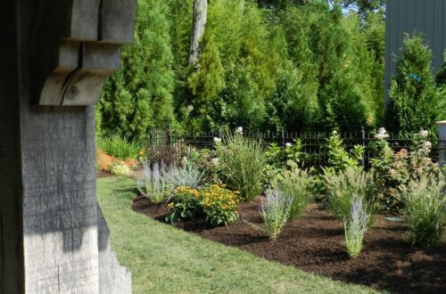 Bolton Landscape Design & Masonry specializing in plantings, sprinkler systems, patios, grills, driveway construction, and grading since 1979.