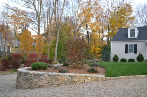 Bolton Landscape Design & Masonry specializing in plantings, sprinkler systems, patios, grills, driveway construction, and grading since 1979.