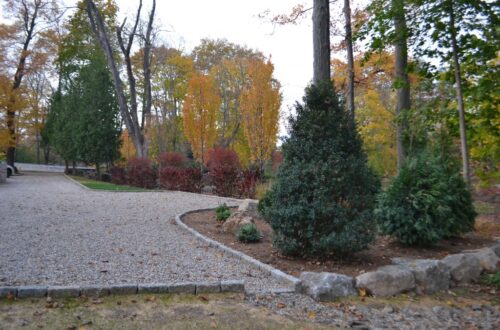 Bolton Landscape Design & Masonry specializing in plantings, sprinkler systems, patios, grills, driveway construction, and grading since 1979.