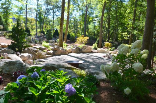 Bolton Landscape Design & Masonry specializing in plantings, sprinkler systems, patios, grills, driveway construction, and grading since 1979.