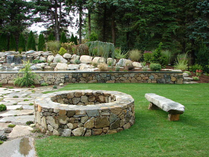 Bolton Landscape Design & Masonry specializing in plantings, sprinkler systems, patios, grills, driveway construction, and grading since 1979. fire pit fireplace