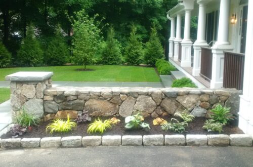 Bolton Landscape Design & Masonry specializing in plantings, sprinkler systems, patios, grills, driveway construction, and grading since 1979.