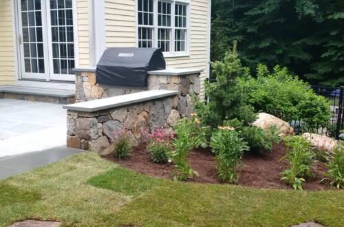 Bolton Landscape Design & Masonry specializing in plantings, sprinkler systems, patios, grills, driveway construction, and grading since 1979.