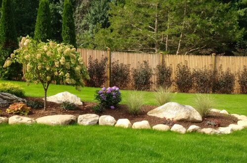 Bolton Landscape Design & Masonry specializing in plantings, sprinkler systems, patios, grills, driveway construction, and grading since 1979.