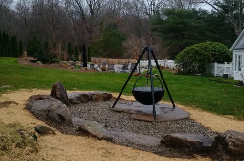 Bolton Landscape Design & Masonry specializing in plantings, sprinkler systems, patios, grills, driveway construction, and grading since 1979.