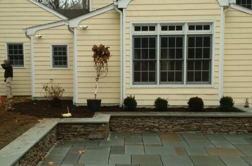 Bolton Landscape Design & Masonry specializing in plantings, sprinkler systems, patios, grills, driveway construction, and grading since 1979.