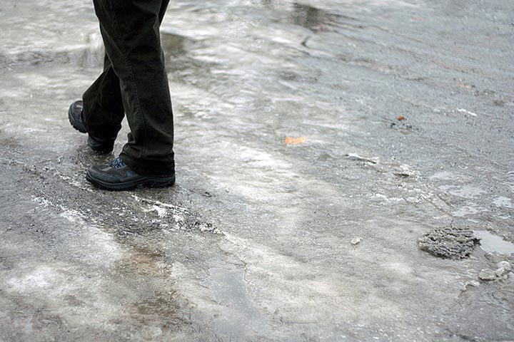 ice buildup in driveway. driveway ice. driveway grading