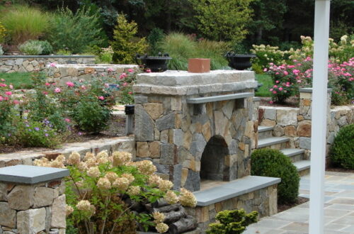 Bolton Landscape Design & Masonry specializing in plantings, sprinkler systems, patios, grills, driveway construction, and grading since 1979.