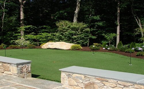 Bolton Landscape Design & Masonry specializing in plantings, sprinkler systems, patios, grills, driveway construction, and grading since 1979.