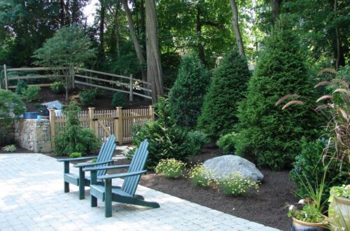 Bolton Landscape Design & Masonry specializing in plantings, sprinkler systems, patios, grills, driveway construction, and grading since 1979.