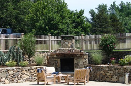 Bolton Landscape Design & Masonry specializing in plantings, sprinkler systems, patios, grills, driveway construction, and grading since 1979.